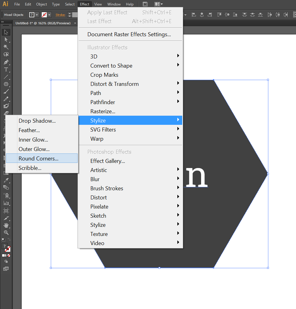 go to Effects in the top bar, then Effects under Illustrator Effects, then click the Rounded Corners option